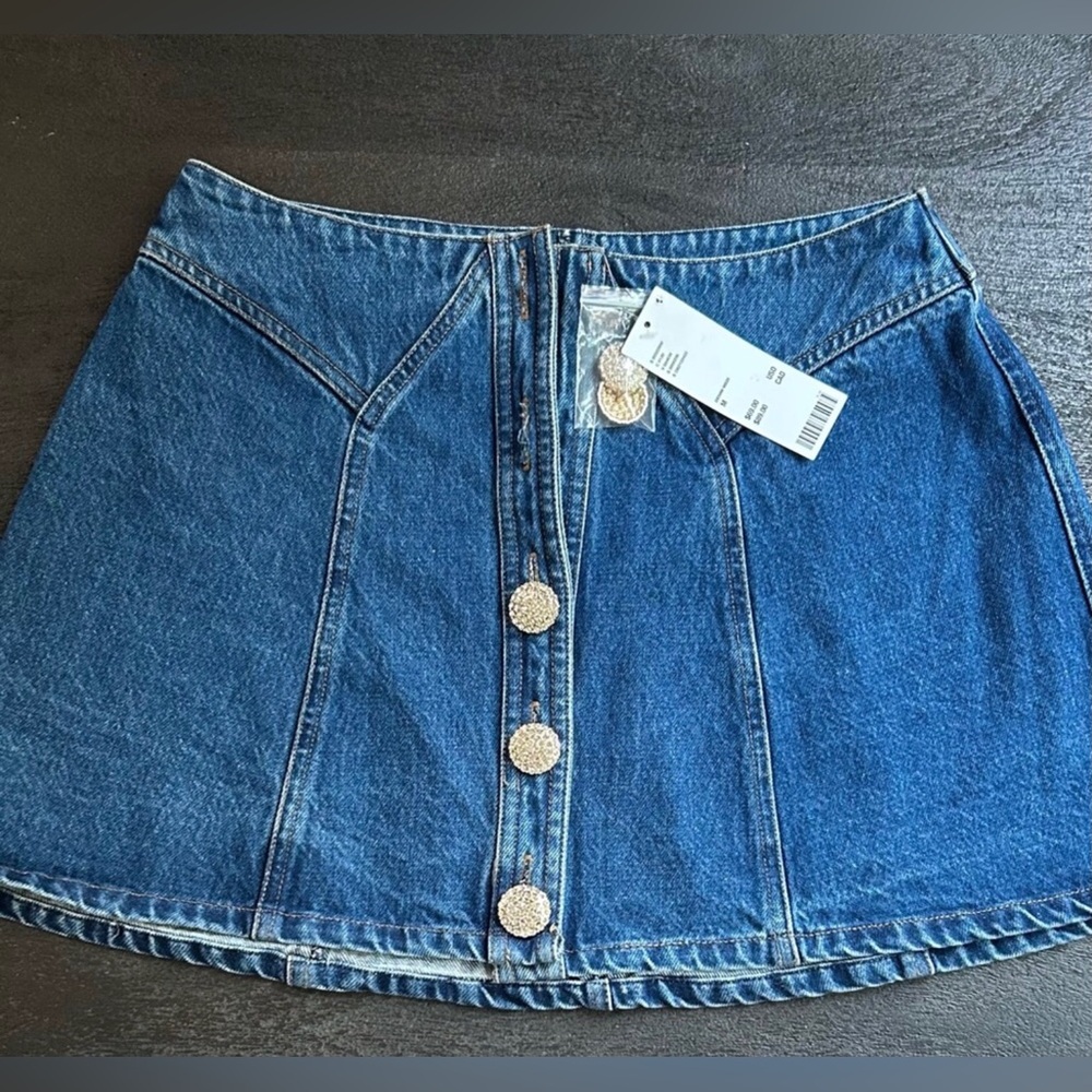 Kimchi Blue Mackenzie Embellished Button Denim
Mini Skirt / SOLD OUT